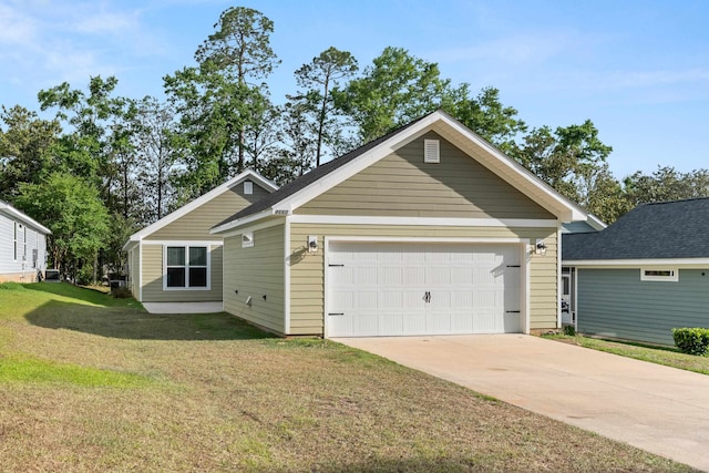 craftsman-style home featuring an attached garage, a front lawn, and driveway