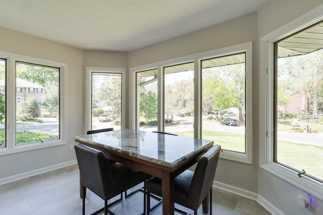 dining space with baseboards