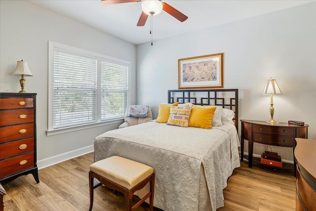 7277 White Clover Ct, Tallahassee, FL 32311 - bedroom with multiple windows, light wood-style floors, and baseboards