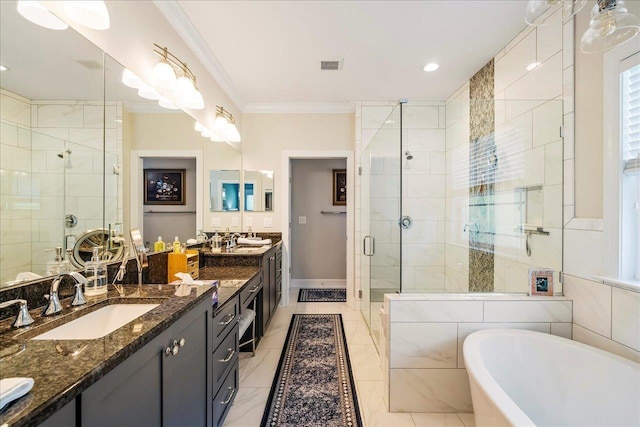 7277 White Clover Ct, Tallahassee, FL 32311 - full bathroom with crown molding, a shower stall, a freestanding tub, two vanities, and marble finish flooring