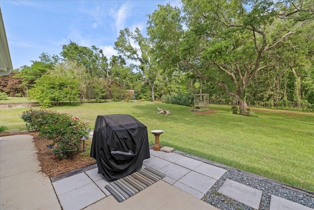 7277 White Clover Ct, Tallahassee, FL 32311 - view of grassy yard featuring a patio area