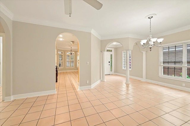 370 Rob Roy Trl, Tallahassee, FL 32312 - empty room featuring arched walkways, a chandelier, light tile patterned flooring, crown molding, and plenty of natural light