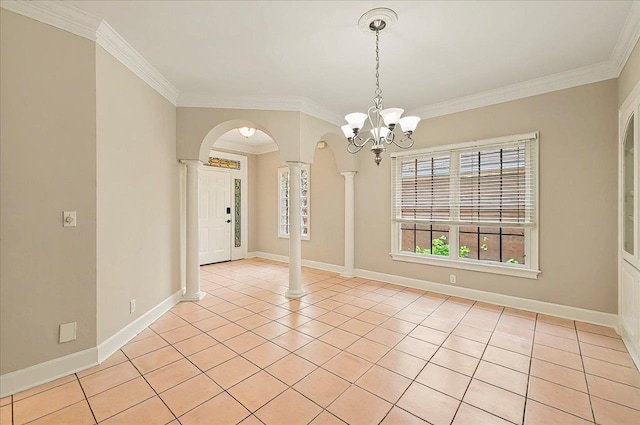 370 Rob Roy Trl, Tallahassee, FL 32312 - unfurnished dining area with ornamental molding, arched walkways, a chandelier, light tile patterned flooring, and baseboards