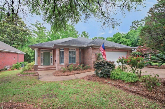 view of front of home with concrete driveway, brick siding, a front lawn, and a garage