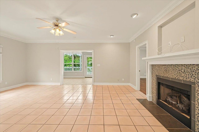 370 Rob Roy Trl, Tallahassee, FL 32312 - unfurnished living room with a ceiling fan, a tiled fireplace, crown molding, light tile patterned floors, and baseboards