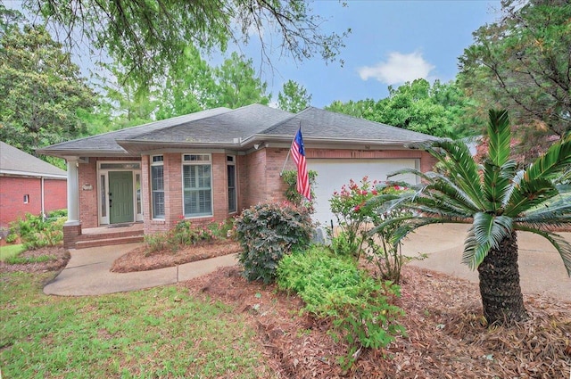 370 Rob Roy Trl, Tallahassee, FL 32312 - view of front of property featuring a garage, brick siding, and driveway