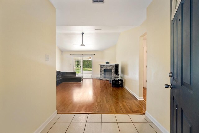 8325 Yellow Ln, Tallahassee, FL 32311 - foyer featuring a stone fireplace and light wood-type flooring