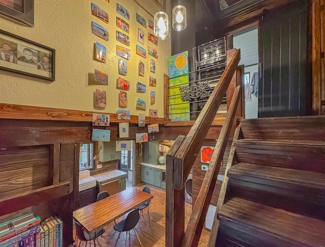 stairway with wood-type flooring