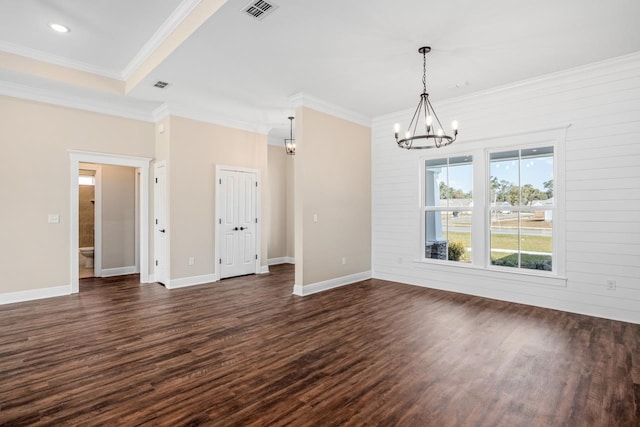 273 Springdale Dr, Crawfordville, FL 32327 - empty room featuring a chandelier, dark wood-style flooring, crown molding, and recessed lighting