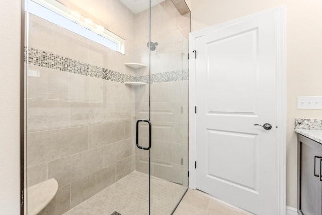 273 Springdale Dr, Crawfordville, FL 32327 - full bath with a shower stall, vanity, and tile patterned floors