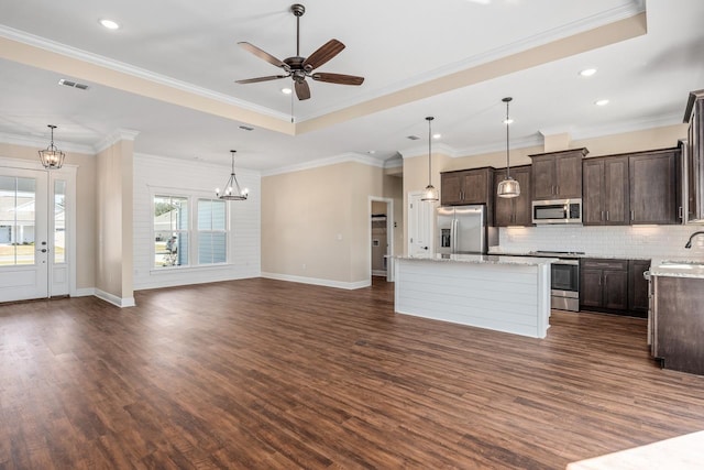 273 Springdale Dr, Crawfordville, FL 32327 - kitchen with appliances with stainless steel finishes, a center island, dark brown cabinets, dark wood-style flooring, and ceiling fan