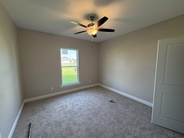 273 Springdale Dr, Crawfordville, FL 32327 - carpeted empty room featuring a ceiling fan and baseboards