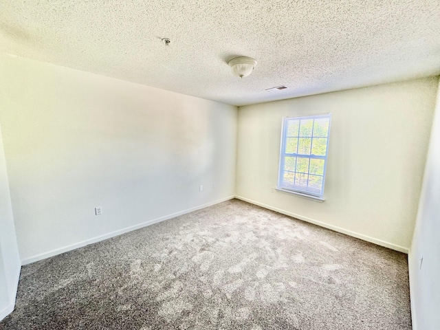 3000 S Adams St Unit 234, Tallahassee, FL 32301 - unfurnished room with carpet flooring, a pendent fire sprinkler, baseboards, and a textured ceiling