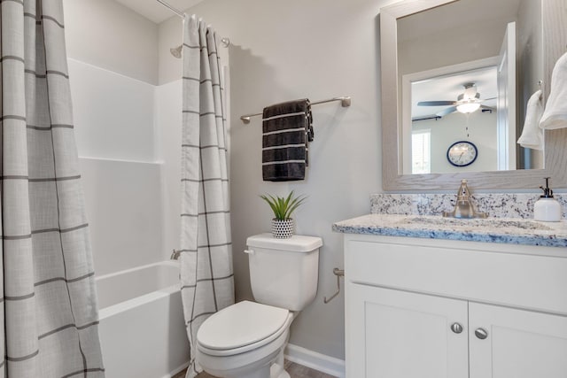 full bathroom with ceiling fan, vanity, toilet, and shower / bath combo