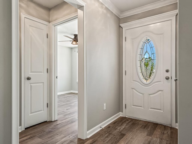 foyer entrance featuring ceiling fan, hardwood / wood-style floors, and ornamental molding