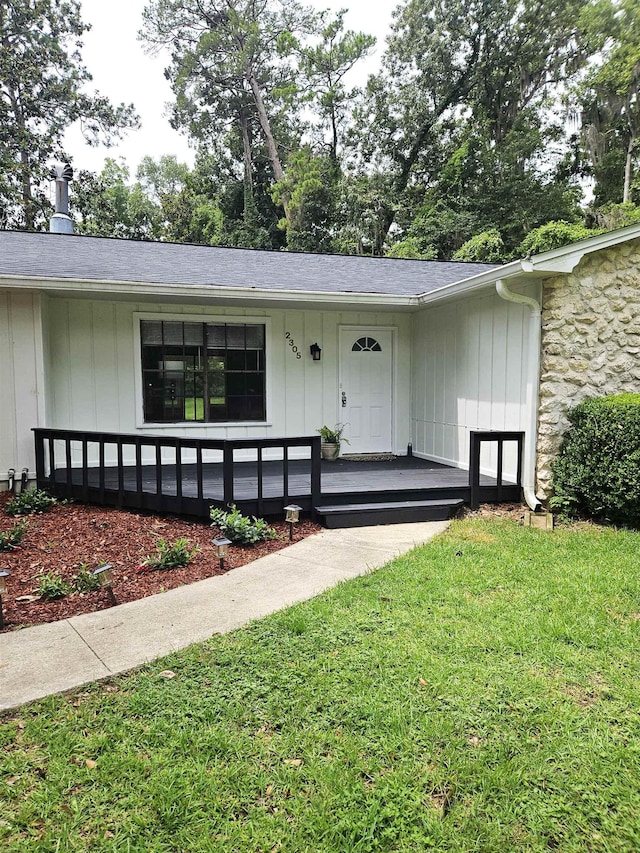 2305 Carrick Ct, Tallahassee, FL 32309 - view of front of property featuring a porch and a front lawn