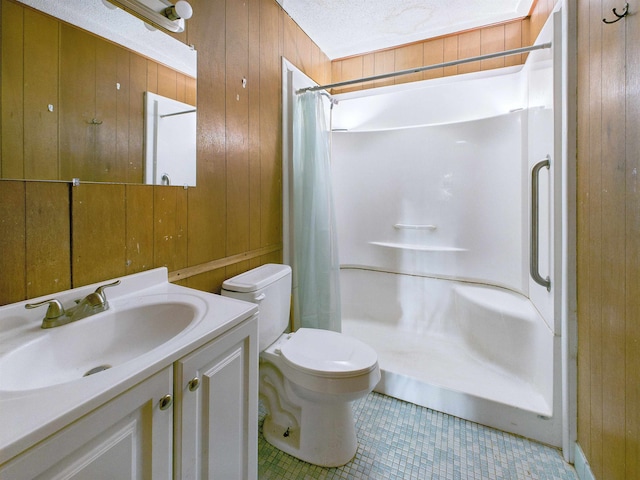 302 Goff St, Perry, FL 32347 - bathroom with wooden walls, vanity, a shower with curtain, and tile patterned flooring