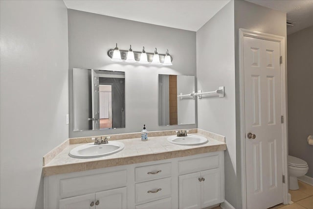 2965 N Shamrock, Tallahassee, FL 32309 - full bath with double vanity and tile patterned flooring