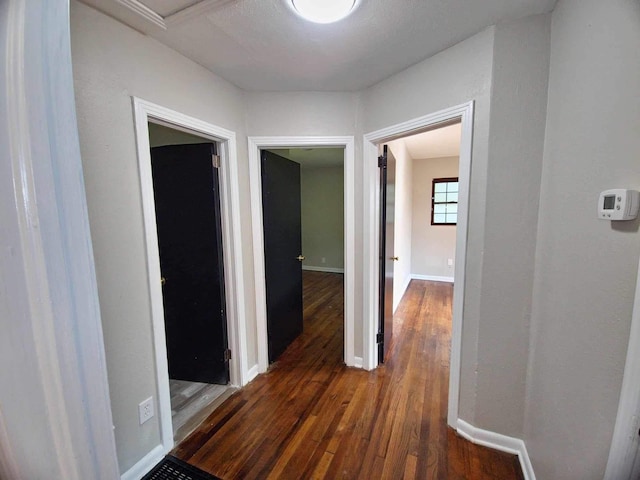 2031 Holmes St, Tallahassee, FL 32310 - hallway with baseboards and wood finished floors