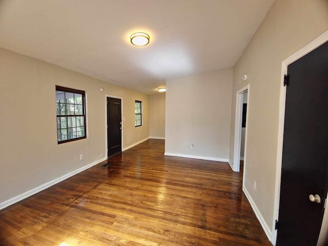 2031 Holmes St, Tallahassee, FL 32310 - unfurnished room with baseboards and wood finished floors
