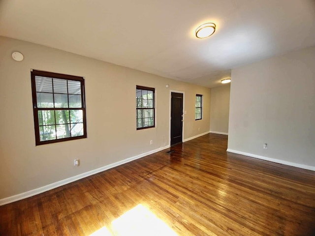 2031 Holmes St, Tallahassee, FL 32310 - unfurnished room featuring wood finished floors and baseboards