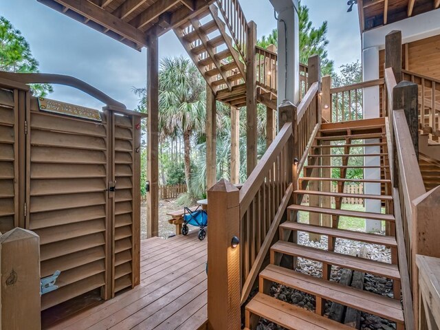 641 Bald Point Rd, Alligator Point, FL 32346 - deck featuring stairs