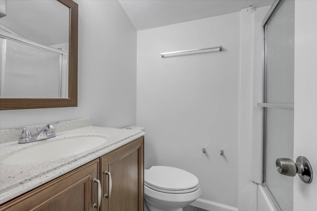 1317 Airport Dr Unit F12, Tallahassee, FL 32304 - bathroom featuring vanity, a shower with shower door, and toilet