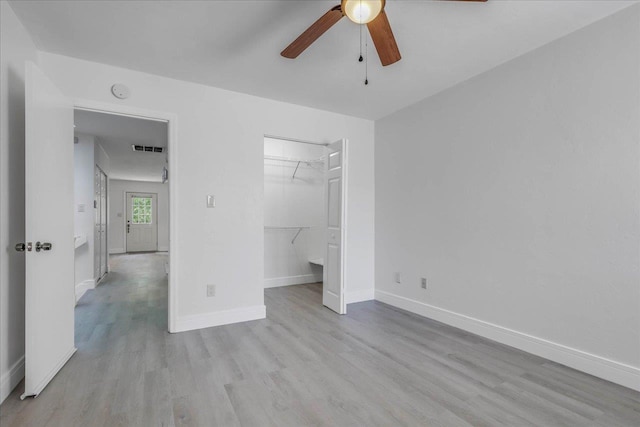 1317 Airport Dr Unit F12, Tallahassee, FL 32304 - unfurnished bedroom featuring baseboards, ceiling fan, wood finished floors, and visible vents