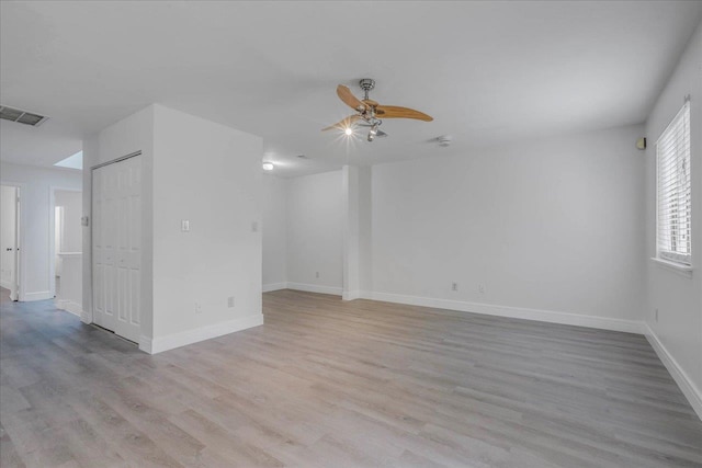 1317 Airport Dr Unit F12, Tallahassee, FL 32304 - empty room with baseboards, ceiling fan, light wood-type flooring, and visible vents