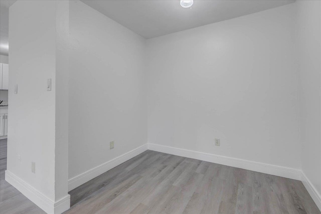 1317 Airport Dr Unit F12, Tallahassee, FL 32304 - unfurnished room featuring light wood-style floors and baseboards