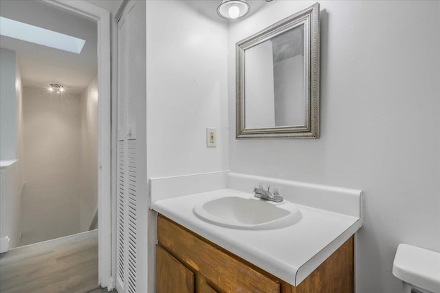 1317 Airport Dr Unit F12, Tallahassee, FL 32304 - half bath with vanity, a skylight, and toilet