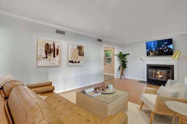 living room featuring parquet floors and ornamental molding