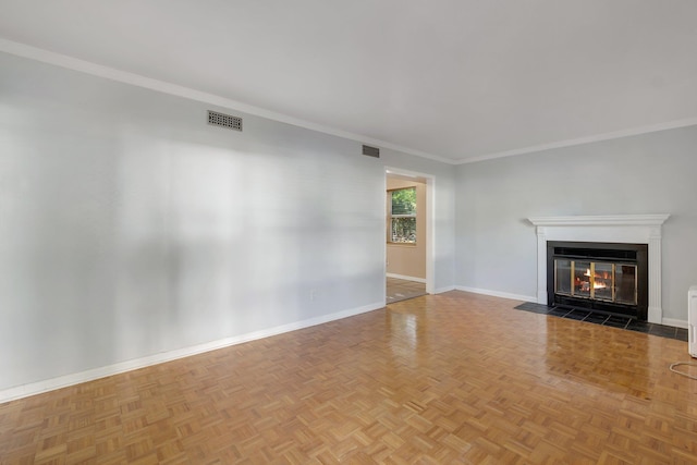 unfurnished living room featuring parquet floors and ornamental molding