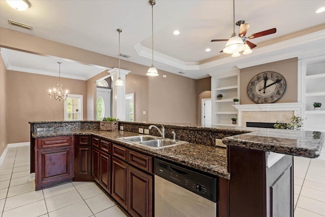 kitchen featuring sink, light tile patterned floors, decorative light fixtures, stainless steel dishwasher, and crown molding