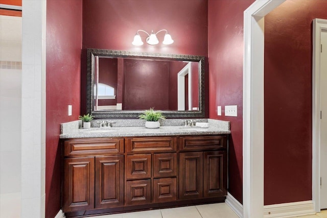 bathroom with vanity and tile patterned flooring