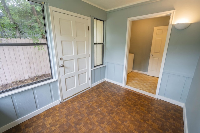 1553 Goodwood Dr, Tallahassee, FL 32308 - foyer featuring a decorative wall, wainscoting, and baseboards