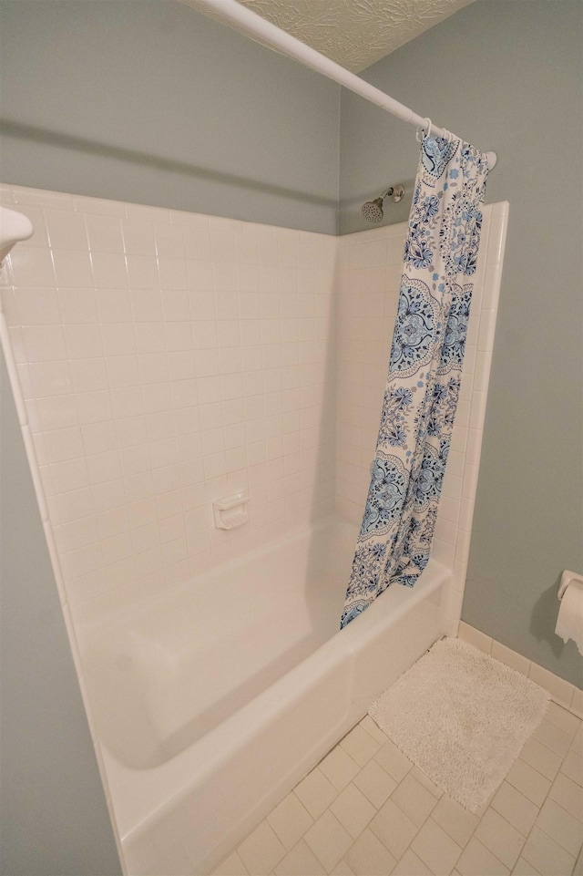 1553 Goodwood Dr, Tallahassee, FL 32308 - full bath with tile patterned flooring and shower / bath combo with shower curtain