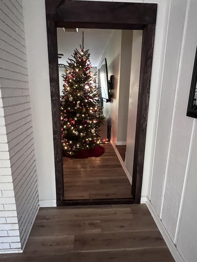 hallway featuring dark hardwood / wood-style floors