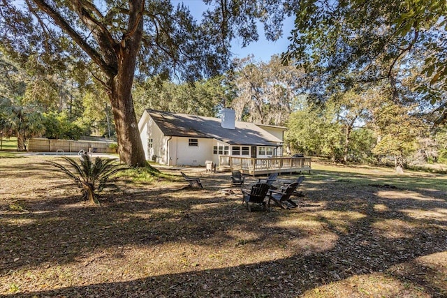 view of yard with a wooden deck