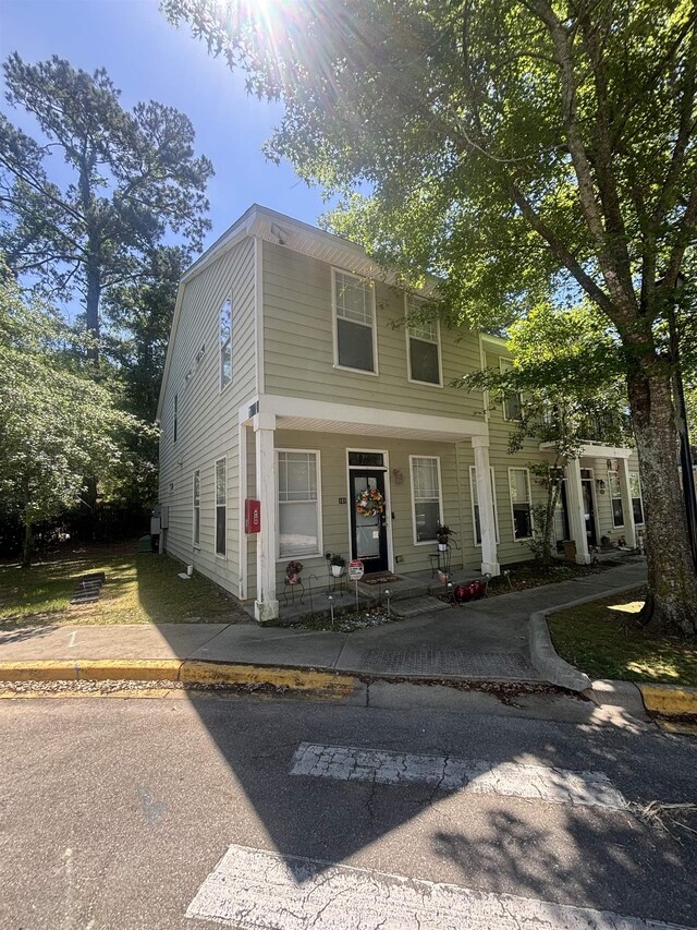 1417 Pullen Rd Unit 101, Tallahassee, FL 32303 - view of front of home featuring covered porch
