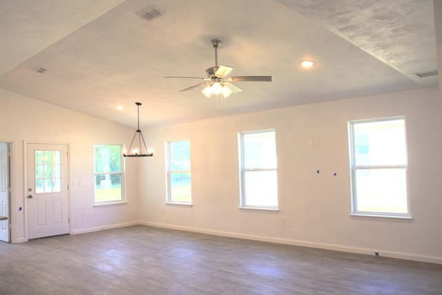 spare room featuring baseboards, visible vents, and dark wood-style flooring