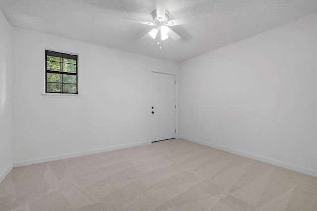 1846 Sylvan Ct, Tallahassee, FL 32303 - empty room with a textured ceiling, light colored carpet, a ceiling fan, and baseboards