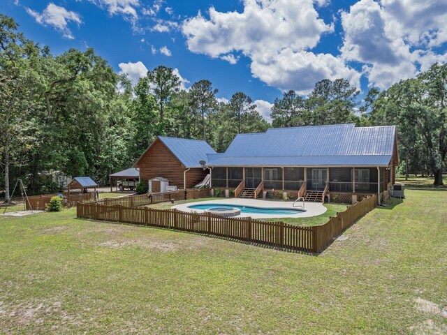 883 Hunters Trce, Crawfordville, FL 32327 - view of pool featuring a sunroom, stairway, and view of scattered trees