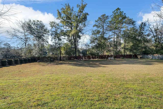 view of yard featuring fence