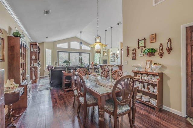 24064 Lanier St, Tallahassee, FL 32310 - dining room with visible vents, wood finished floors, and lofted ceiling