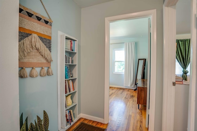 hallway featuring hardwood / wood-style flooring