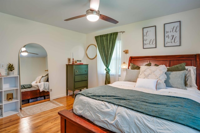 bedroom featuring ceiling fan and light wood-type flooring