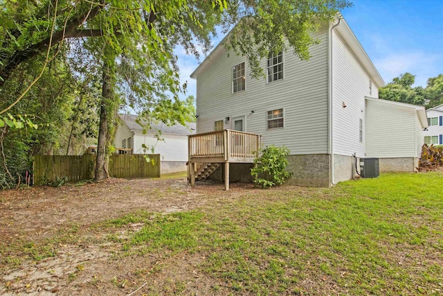 back of property featuring central AC, a deck, and stairs
