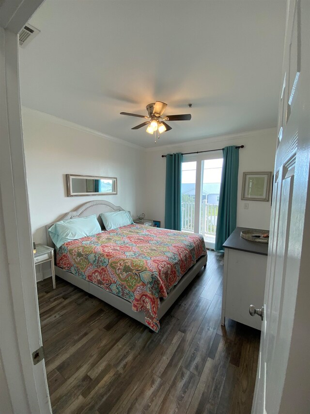 bedroom featuring dark wood-type flooring, access to outside, ceiling fan, and crown molding