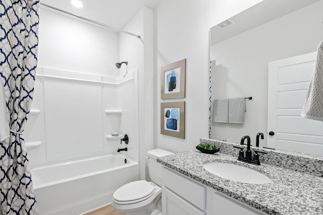 full bathroom featuring hardwood / wood-style floors, vanity, toilet, and shower / bathtub combination with curtain